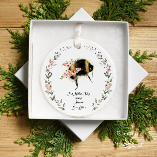 Personalised First Mother's Day Gift - A Unique Keepsake for New Mums

Celebrate your first Mother's Day with a thoughtful and personalised gift that will be cherished for years to come. Our ceramic keepsake, featuring a beautiful floral bee design, can be customised with your chosen names.

Our beautiful ceramic keepsake ornament comes with a white ribbon for hanging.